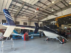 Bell 407 helicopter with custom exterior vinyl striping and specialty graphics