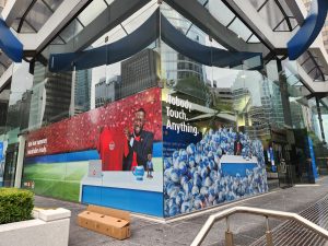 Large-format BMO commercial window graphics installed across a glass storefront