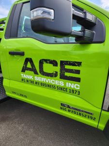 ACE Tank Services commercial truck graphics and vehicle lettering installed by Garage One